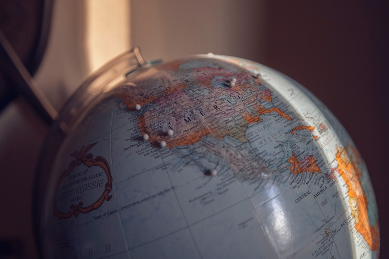 A globe showcased in a room, representing the spirit of discovery and knowledge about the world.