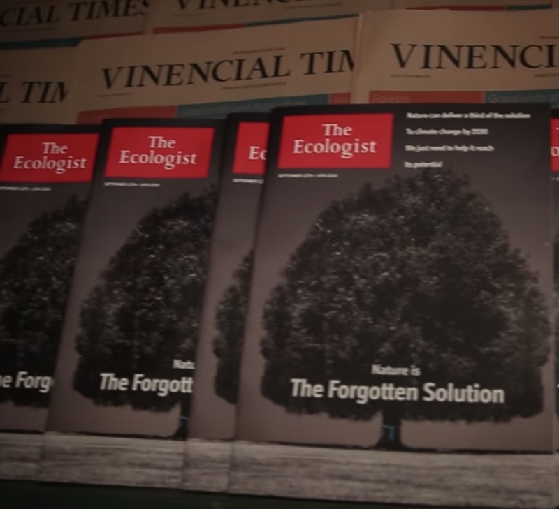 A bottle of organic fertilizer left on a dusty shelf in a greenhouse, labeled as the forgotten solution by the ecologist.